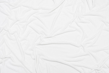 Obraz premium White crumpled blanket, plaid, background with copy space, top view