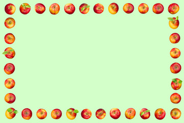 Frame of apples isolated on a green background