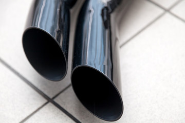 Exhaust system with a double black nozzle on the pipe to increase the power of the car and tuning...
