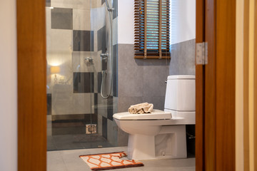 Bathroom with basin, toilet and shower