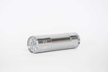 Aluminum flash light on white