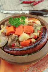 plate of royal couscous with lamb chicken and merguez