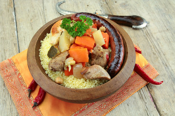 plate of royal couscous with lamb chicken and merguez