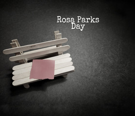 inspirational  celebration day of rosa parks day with seat and blank paper background
