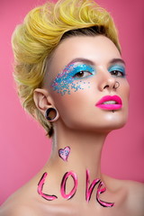 Beautiful girl look in pop art style with inscription love