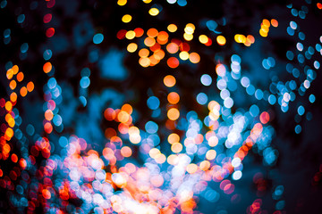 Golden bokeh mixed with blurred blue light from winter trees in Thailand. Business theoretical...