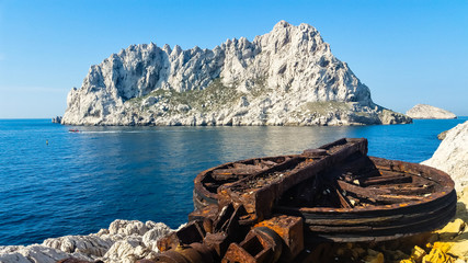 Rusty ruins from a boat shipwrecked in the Calanques de Marseille, France.