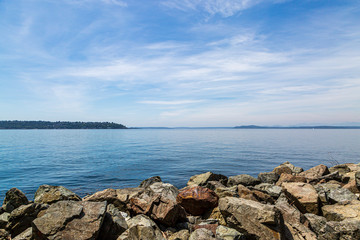 Looking out over the calm water of Elliott Bay, in the city of Seattle