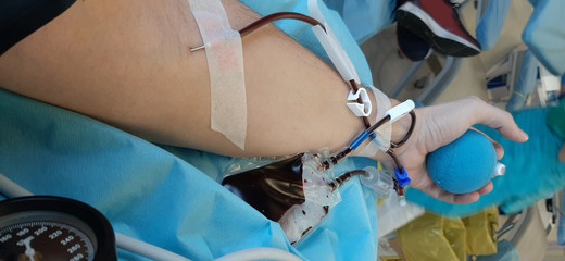 Young man during the blood donation