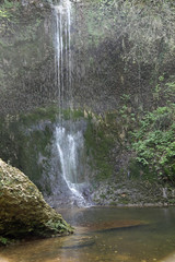 high waterfall in the forest