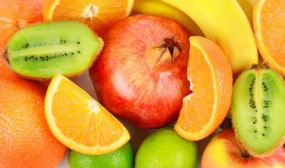 Bright beautiful background of ripe fruits. Organic food.