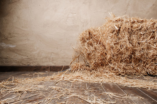 Wooden floor background and dry straw