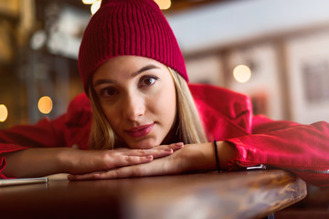 Portrait of beautiful urban girl out in the café club. Modern youth culture. Young woman with...