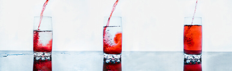 A glass in which is poured red wine on abstract background. Space for  text