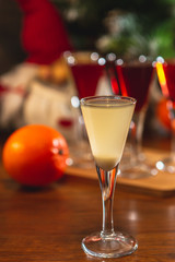 Set of glasses with different colored tinctures made on the basis of fruits and alcohol, a wonderful aperitif before the festive dinner