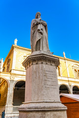 Fototapeta premium Monument of poet Dante Alighieri in the Piazza dei Signori in Verona, Italy