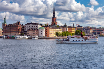 Fototapeta na wymiar Stockholm. View of the city embankment of the island of Gamla Stan.
