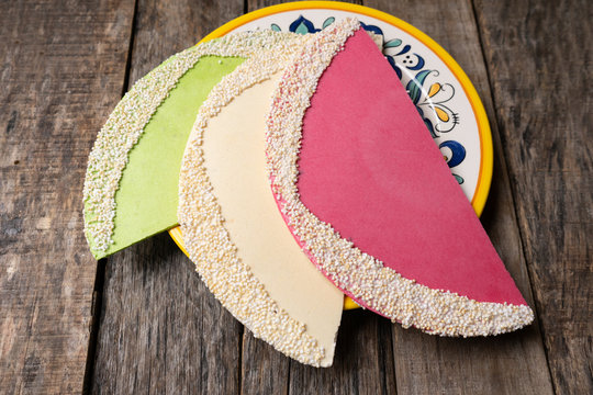 Mexican candy also called "obleas" on wooden background