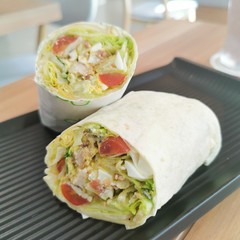 tortilla wraps with meat and vegetables