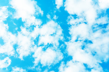 Blue sky with fluffy clouds, abstract background