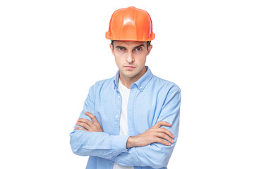 Serious builder in hardhat, isolated background, copy space