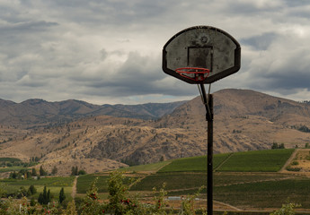 Old basketball hoop in countryside © Dawn