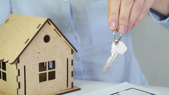 Counting, adding coins, having aim to sign contract for paying separate house