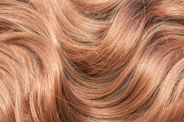 Naklejka premium Beautiful wavy hair texture, light brown hair