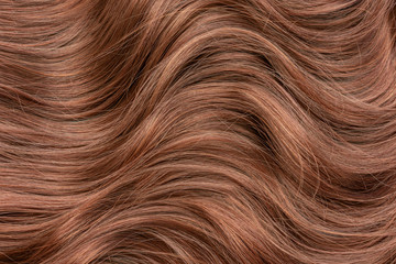 Fototapeta premium Beautiful wavy hair texture, light brown hair