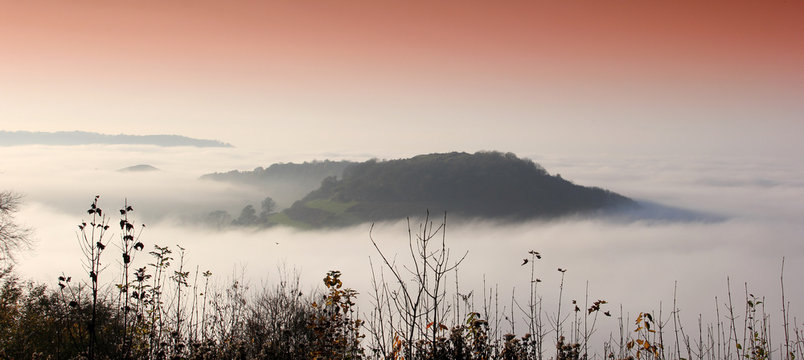 View of Cam Long Down and hills from Uley Fort, Uley, Gloucestershire, UK