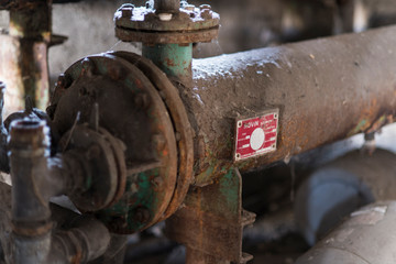 An old pipe of an abandoned factory