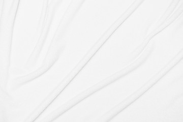 Obraz premium White crumpled blanket, plaid, background with copy space, top view