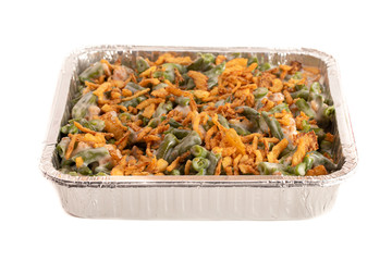 Pan of Traditional Green Bean Casserole with Fried Onions Isolated on a White Background