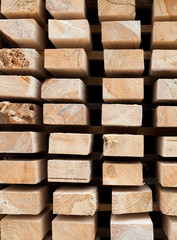 Wooden planks. Beams. Air-drying timber stack.