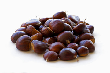 Chestnuts on a white background.
