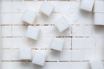 Abstract background in the form of white cubes of granular structure.