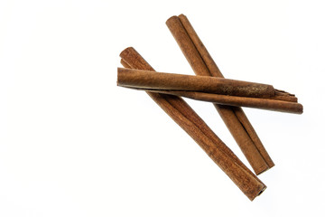 Cinnamon sticks on a white background