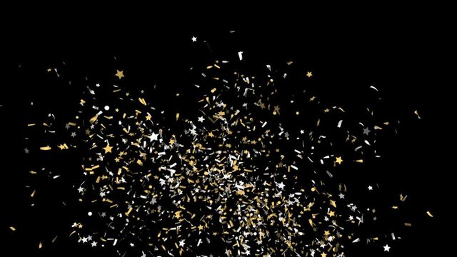 Gold festive confetti explosion falling down on a black and green background. Slow motion footage.