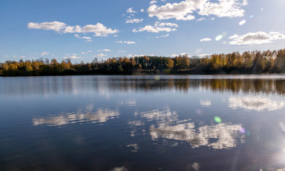 colorful autumn landscape by the lake, golden autumn, colorful trees and reflections
