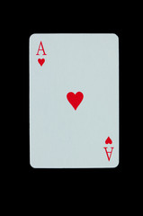 Ace of hearts. Playing card isolated on black background.