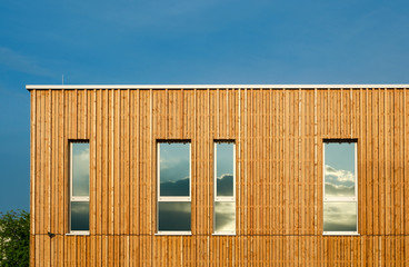 Wooden facade of a modern architecture building  frontal symmetric view