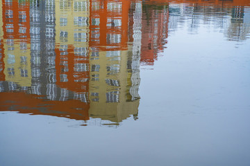 high-rise building reflection in water, texture