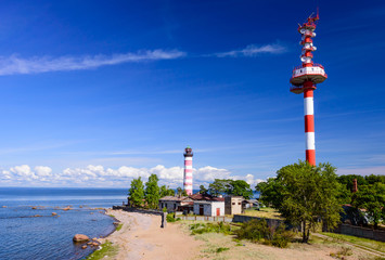 Shepelevsky lighthouse on the picturesque coast of the Gulf of Finland. Beautiful summer view of...