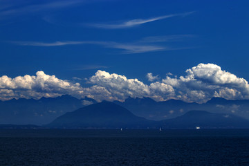 Shades of blue dotted by the clouds on the Pacific Ocean, BC, Canada