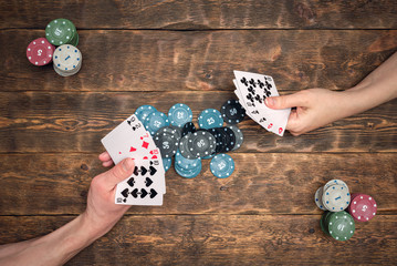 Two players are playing in poker flat lay abstract background.