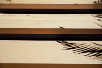 A small wooden new built staircase with three steps