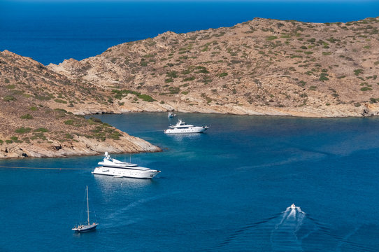 Luxury yachts in bay on south coast Ios Island Greek Islands Greece