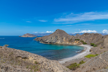 Fototapeta premium Landscape view at Padar island bay with crystal clear water in Komodo islands, Flores, Indonesia.