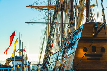 Old wooden ship at sunset