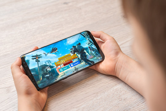 Sarajevo, Bosnia and Herzegovina - November 29, 2019: PlayerUnknown's Battlegrounds or PUBG online multiplayer battle royale game on Samsung Galaxy S9 plus smart phone in boy hands close-up
